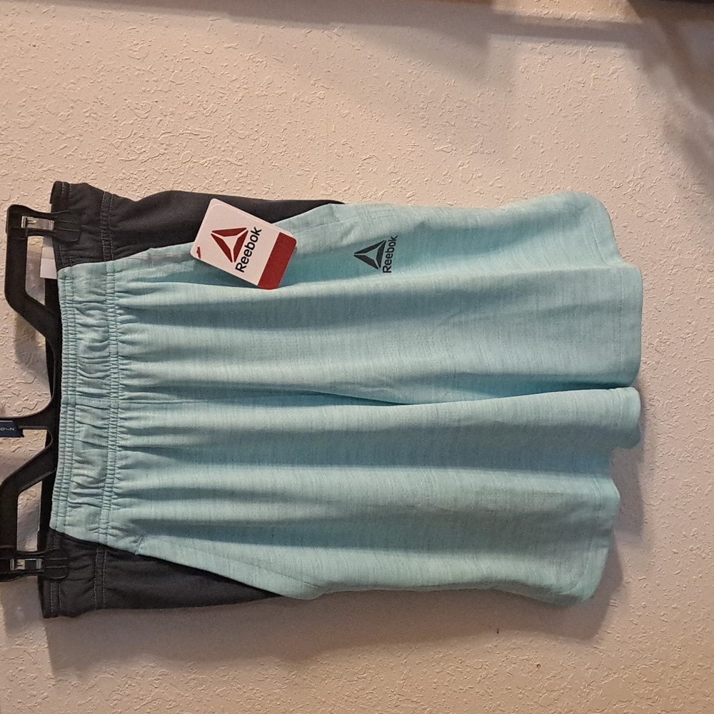 Reebok Athletic Shorts with pockets Sz S New Slim 9in